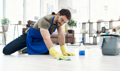 Dallas move-out cleaning professional scrubbing floor for a spotless finish.